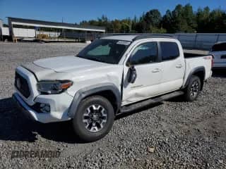 2018 Toyota Tacoma TRD Pro с VIN 5TFCZ5AN3JX143480, выставлен на аукционе Copart как лот 82420005 с пробегом 60 340 миль миль и Списание • Salvage title. История ставок и продаж доступна на DreamBid. Изображение 1.