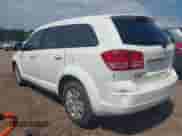 2014 Dodge Journey American Value with VIN 3C4PDCAB9ET198575, listed as a IAAI auction lot 42872868 with 214,944 mi miles and . Bid and sale history available at DreamBid. Image 3.