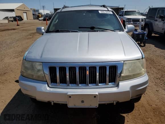 2004 Jeep Grand Cherokee Overland с VIN 1J8GW68J24C399858, выставлен на аукционе Copart как лот 69518935 с пробегом 122 800 миль миль и Чистый • Clean title. История ставок и продаж доступна на DreamBid. Изображение 5.