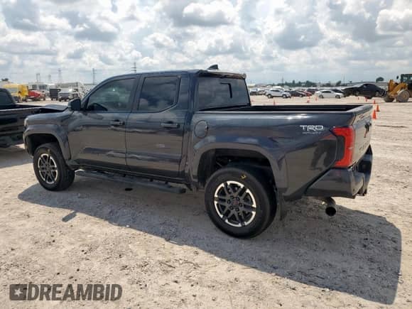 2024 Toyota Tacoma SR5 with VIN 3TMLB5JN1RM024042, listed as a Copart auction lot 70640855 with 23,853 mi miles and Salvage title. Bid and sale history available at DreamBid. Image 2.