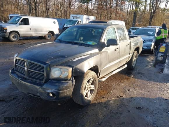2007 Dodge Dakota SLT with VIN 1D7HW48N47S269812, listed as a IAAI auction lot 41496814 with 160,807 mi miles and . Bid and sale history available at DreamBid. Image 2.