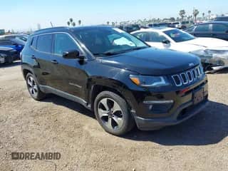 2017 Jeep Compass Latitude z VIN 3C4NJCBB6HT605934, wystawiony jako IAAI lot #41846329 z przebiegiem 145 275 mil mil oraz . Historia ofert i sprzedaży dostępna na DreamBid. Obrazek 1.