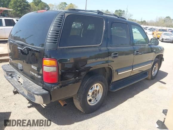 2003 Chevrolet Tahoe LT z VIN 1GNEC13Z03R318933, wystawiony jako IAAI lot #41828148 z przebiegiem 192 851 mil mil oraz . Historia ofert i sprzedaży dostępna na DreamBid. Obrazek 4.