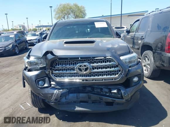 2016 Toyota Tacoma SR5 with VIN 3TMAZ5CNXGM009360, listed as a IAAI auction lot 43186084 with 89,490 mi miles and . Bid and sale history available at DreamBid. Image 13.