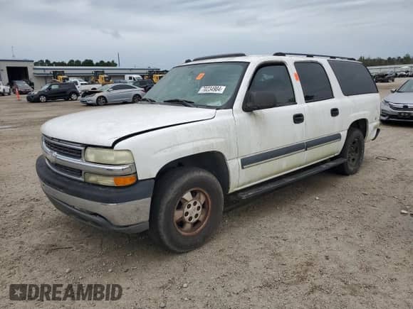 2004 Chevrolet Suburban LS z VIN 3GNEC16Z64G101562, wystawiony jako Copart lot #70234904 z przebiegiem Nie podano mil oraz Szkoda całkowita • Salvage title. Historia ofert i sprzedaży dostępna na DreamBid. Obrazek 1.
