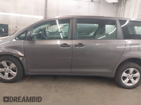 2015 Toyota Sienna L with VIN 5TDZK3DC9FS599350, listed as a IAAI auction lot 42246728 with 99,905 mi miles and . Bid and sale history available at DreamBid. Image 15.