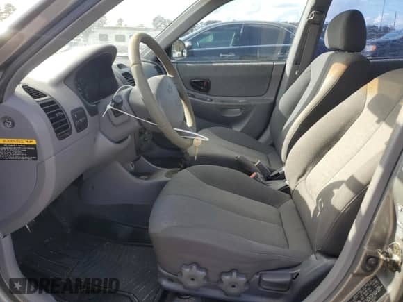 2003 Hyundai Accent GL с VIN KMHCG45C23U476391, выставлен на аукционе Copart как лот 78474264 с пробегом 155 731 миль миль и Списание • Salvage title. История ставок и продаж доступна на DreamBid. Изображение 7.