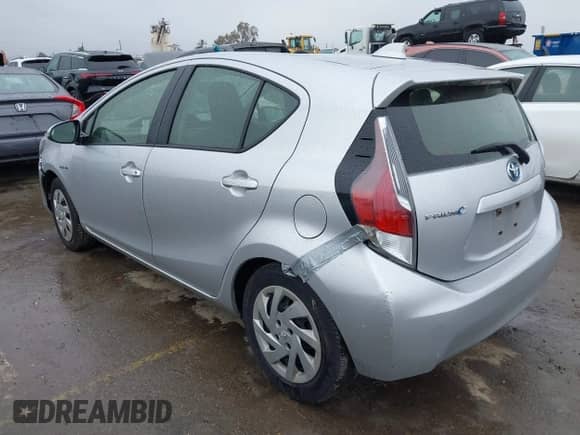 2015 Toyota Prius One z VIN JTDKDTB35F1575641, wystawiony jako IAAI lot #41803870 z przebiegiem 129 286 mil mil oraz . Historia ofert i sprzedaży dostępna na DreamBid. Obrazek 3.