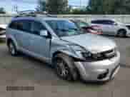 2014 Dodge Journey SXT with VIN 3C4PDDBG4ET190769, listed as a Copart auction lot 80368705 with 140,649 mi miles and Salvage title. Bid and sale history available at DreamBid. Image 4.