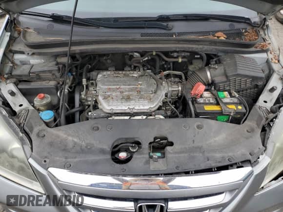 2007 Honda Odyssey EX с VIN 5FNRL38497B072950, выставлен на аукционе Copart как лот 80343045 с пробегом 137 170 миль миль и Списание • Salvage title. История ставок и продаж доступна на DreamBid. Изображение 12.