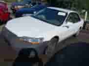 2002 Honda Accord LX with VIN JHMCG56412C004736, listed as a IAAI auction lot 43011114 with 271,977 mi miles and . Bid and sale history available at DreamBid. Image 2.