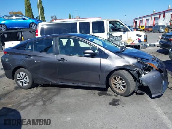 2018 Toyota Prius Two Eco with VIN JTDKARFU4J3552881, listed as a IAAI auction lot 43516332 with 71,276 mi miles and . Bid and sale history available at DreamBid. Image 13.