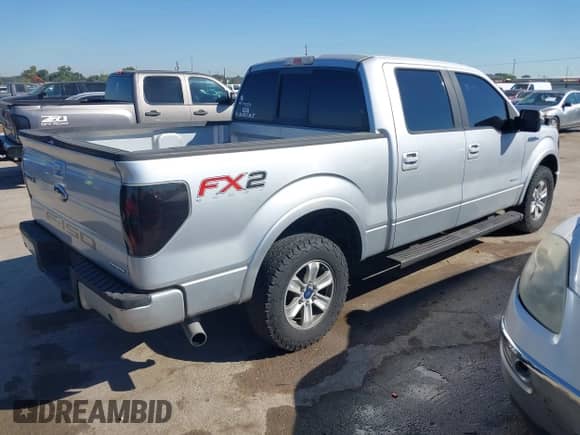 2013 Ford F-150 XLT with VIN 1FTFW1CTXDFA90281, listed as a IAAI auction lot 43453074 with 246,980 mi miles and . Bid and sale history available at DreamBid. Image 4.