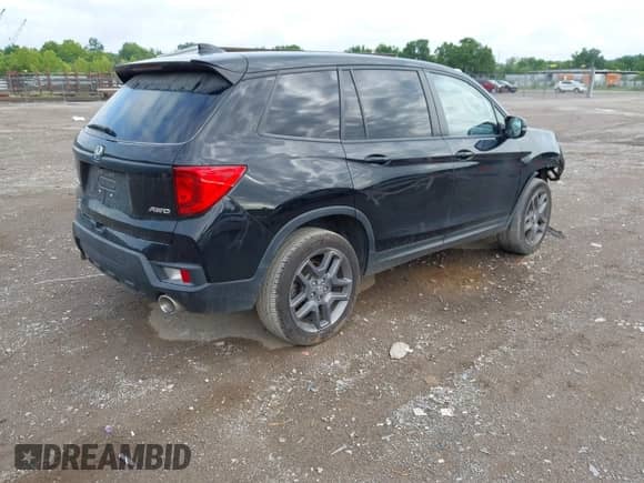 2023 Honda Passport EX-L with VIN 5FNYF8H56PB020149, listed as a IAAI auction lot 42777091 with 39,419 mi miles and . Bid and sale history available at DreamBid. Image 4.