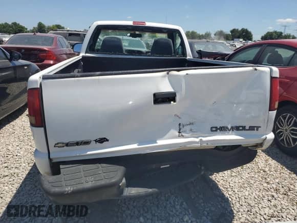 1999 Chevrolet S-10 LS with VIN 1GCCS1449XK124602, listed as a Copart auction lot 62877925 with 120,207 mi miles and Salvage title. Bid and sale history available at DreamBid. Image 6.