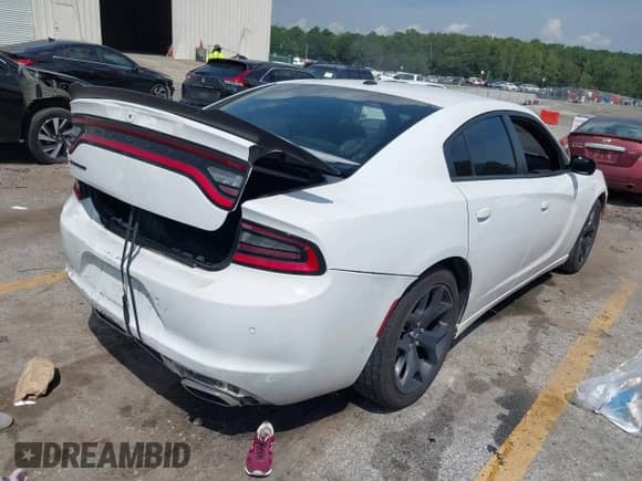 2020 Dodge Charger SXT with VIN 2C3CDXBG9LH238776, listed as a IAAI auction lot 43107019 with 121,419 mi miles and . Bid and sale history available at DreamBid. Image 4.