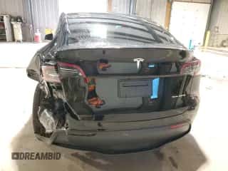 2023 Tesla Model Y Long Range with VIN 7SAYGAEE5PF921301, listed as a Copart auction lot 67586274 with 3,969 mi miles and Salvage title. Bid and sale history available at DreamBid. Image 6.