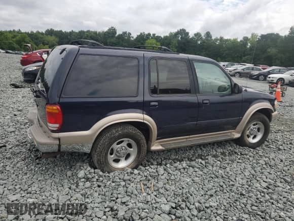 1999 Ford Explorer XLT with VIN 1FMDU34EXXZB35517, listed as a Copart auction lot 64431625 with 111,443 mi miles and Salvage title. Bid and sale history available at DreamBid. Image 3.