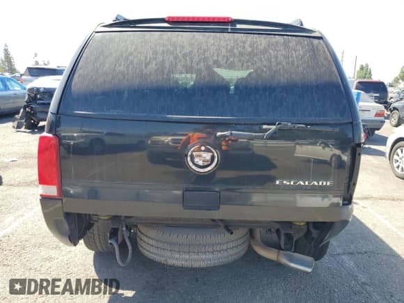 2004 Cadillac Escalade with VIN 1GYEK63N44R264635, listed as a Copart auction lot 71562105 with 212,642 mi miles and Salvage title. Bid and sale history available at DreamBid. Image 6.