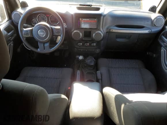 2012 Jeep Wrangler Sport with VIN 1C4AJWAG5CL113509, listed as a Copart auction lot 87483435 with 173,046 mi miles and Clean title. Bid and sale history available at DreamBid. Image 8.