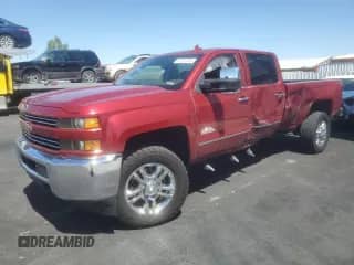 2018 Chevrolet Silverado 2500HD High Country с VIN 1GC1KXEY1JF210983, выставлен на аукционе Copart как лот 61487485 с пробегом Не указан миль и Списание • Salvage title. История ставок и продаж доступна на DreamBid. Изображение 1.