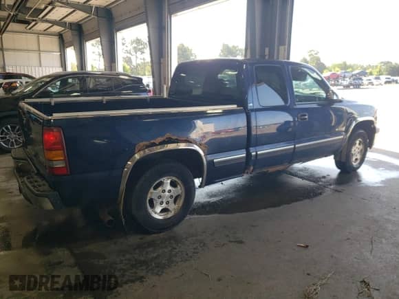 2001 Chevrolet Silverado 1500 LS z VIN 1GCEK19V51E148749, wystawiony jako Copart lot #63181354 z przebiegiem Nie podano mil oraz Szkoda całkowita • Salvage title. Historia ofert i sprzedaży dostępna na DreamBid. Obrazek 3.