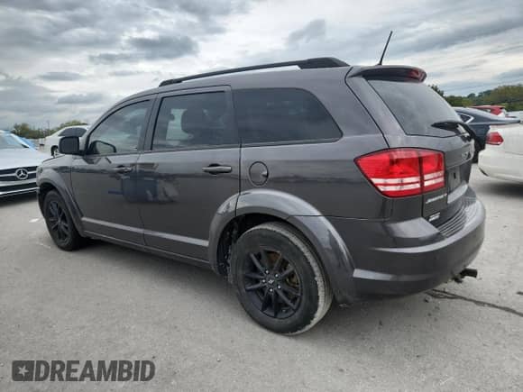 2020 Dodge Journey SE Value with VIN 3C4PDCABXLT277136, listed as a Copart auction lot 83946515 with 68,068 mi miles and Salvage title. Bid and sale history available at DreamBid. Image 2.