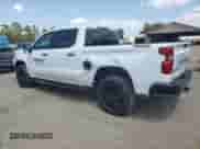 2024 Chevrolet Silverado 1500 Custom Trail Boss z VIN 3GCUDCE89RG392815, wystawiony jako Copart lot #70260445 z przebiegiem 29 021 mil mil oraz Szkoda całkowita • Salvage title. Historia ofert i sprzedaży dostępna na DreamBid. Obrazek 2.