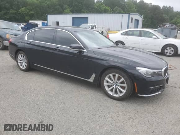 2019 BMW 7 Series 740i xDrive with VIN WBA7E4C55KGV70212, listed as a Copart auction lot 57330965 with 48,408 mi miles and Salvage title. Bid and sale history available at DreamBid. Image 4.