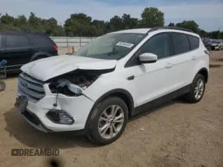 2018 Ford Escape SE z VIN 1FMCU9GD5JUA76026, wystawiony jako Copart lot #80566555 z przebiegiem 84 012 mil mil oraz Szkoda całkowita • Salvage title. Historia ofert i sprzedaży dostępna na DreamBid. Obrazek 1.
