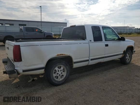 1995 GMC Sierra 1500 z VIN 2GTEC19K8S1573758, wystawiony jako Copart lot #64785104 z przebiegiem 191 121 mil mil oraz Szkoda całkowita • Salvage title. Historia ofert i sprzedaży dostępna na DreamBid. Obrazek 3.