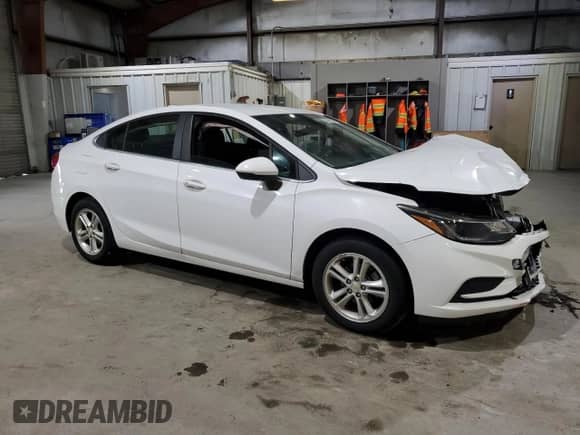 2018 Chevrolet Cruze LT с VIN 1G1BE5SM3J7244654, выставлен на аукционе Copart как лот 70651465 с пробегом 93 218 миль миль и Списание • Salvage title. История ставок и продаж доступна на DreamBid. Изображение 4.