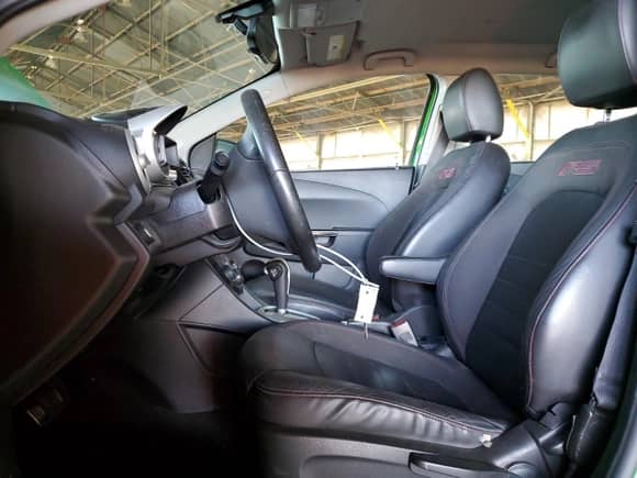 2015 Chevrolet Sonic RS with VIN 1G1JG6SB7F4148660, listed as a Copart auction lot 50094985 with 81,995 mi miles and Salvage title. Bid and sale history available at DreamBid. Image 7.