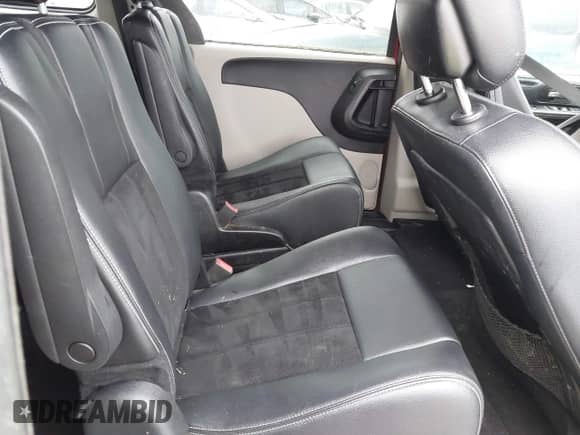 2014 Dodge Grand Caravan SXT with VIN 2C4RDGCG8ER344332, listed as a IAAI auction lot 42941989 with 165,945 mi miles and . Bid and sale history available at DreamBid. Image 8.