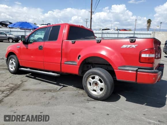 2006 Ford F-150 STX with VIN 1FTRX02W26KB93690, listed as a Copart auction lot 48538695 with 256,118 mi miles and Salvage title. Bid and sale history available at DreamBid. Image 2.