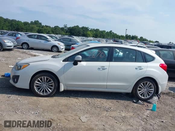 2012 Subaru Impreza Limited с VIN JF1GPAK60CH201278, выставлен на аукционе IAAI как лот 42827870 с пробегом 153 647 миль миль и . История ставок и продаж доступна на DreamBid. Изображение 14.