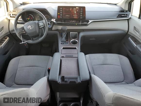 2022 Toyota Sienna LE с VIN 5TDKSKFCXNS062431, выставлен на аукционе Copart как лот 70089465 с пробегом 75 789 миль миль и Списание • Salvage title. История ставок и продаж доступна на DreamBid. Изображение 8.