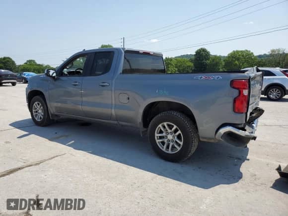 2019 Chevrolet Silverado 1500 LT with VIN 1GCRYDEK8KZ275647, listed as a Copart auction lot 58829495 with 124,577 mi miles and Salvage title. Bid and sale history available at DreamBid. Image 2.