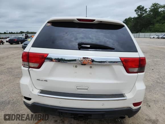 2012 Jeep Grand Cherokee Overland z VIN 1C4RJFCG8CC325367, wystawiony jako Copart lot #66274415 z przebiegiem 149 290 mil mil oraz Szkoda całkowita • Salvage title. Historia ofert i sprzedaży dostępna na DreamBid. Obrazek 6.