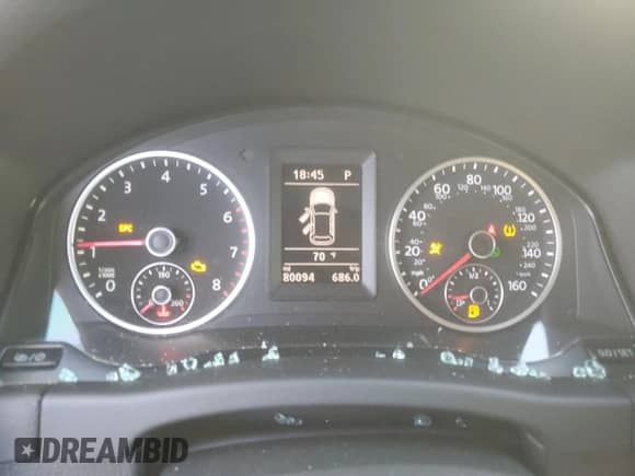 2016 Volkswagen Tiguan S с VIN WVGAV7AX3GW585976, выставлен на аукционе Copart как лот 80874345 с пробегом 80 094 миль миль и Списание • Salvage title. История ставок и продаж доступна на DreamBid. Изображение 9.