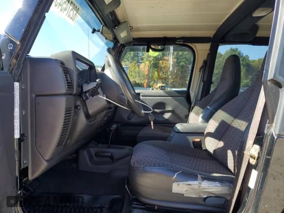 2000 Jeep Wrangler Sport with VIN 1J4FA49S1YP796600, listed as a Copart auction lot 82574545 with 128,340 mi miles and Clean title. Bid and sale history available at DreamBid. Image 7.