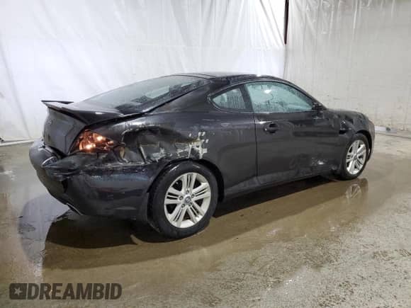 2008 Hyundai Tiburon GS with VIN KMHHM66D48U265282, listed as a Copart auction lot 77391204 with 77,088 mi miles and Salvage title. Bid and sale history available at DreamBid. Image 3.