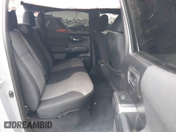 2021 Toyota Tacoma SR5 with VIN 3TMAZ5CN8MM140976, listed as a IAAI auction lot 41513243 with 109,786 mi miles and . Bid and sale history available at DreamBid. Image 8.