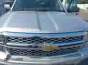 2014 Chevrolet Silverado 1500 LT with VIN 3GCPCREHXEG259073, listed as a IAAI auction lot 43010013 with 128,000 mi miles and . Bid and sale history available at DreamBid. Image 6.