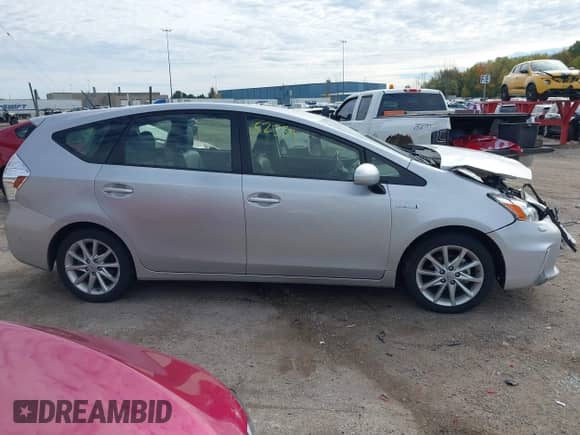 2014 Toyota Prius Three z VIN JTDZN3EU7EJ001878, wystawiony jako IAAI lot #43452334 z przebiegiem 142 272 mil mil oraz . Historia ofert i sprzedaży dostępna na DreamBid. Obrazek 13.