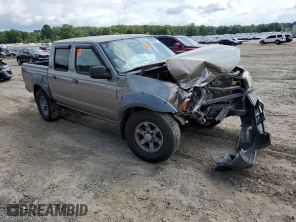 2003 Nissan Frontier SE с VIN 1N6ED27T43C434461, выставлен на аукционе Copart как лот 58852615 с пробегом Не указан миль и Списание • Salvage title. История ставок и продаж доступна на DreamBid. Изображение 4.