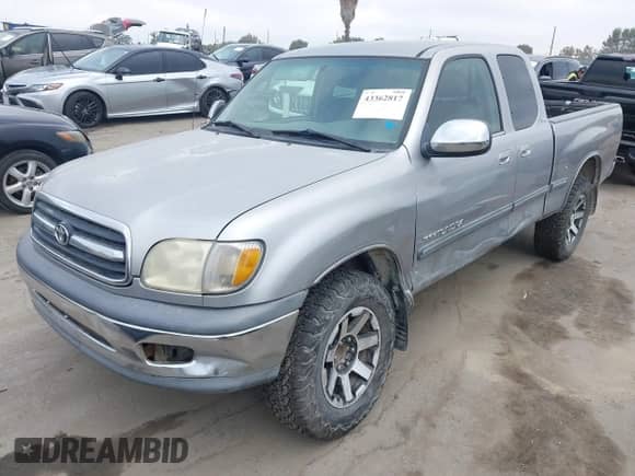 2002 Toyota Tundra SR5 with VIN 5TBRN341X2S230411, listed as a IAAI auction lot 43362817 with 270,679 mi miles and . Bid and sale history available at DreamBid. Image 2.