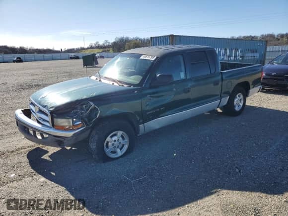 2001 Dodge Dakota Sport with VIN 1B7GL2AX31S212099, listed as a Copart auction lot 44619795 with 225,761 mi miles and Salvage title. Bid and sale history available at DreamBid. Image 1.