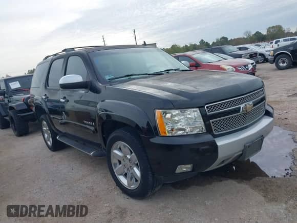 2008 Chevrolet Tahoe LTZ with VIN 1GNFC13068R250019, listed as a IAAI auction lot 41295202 with 143,839 mi miles and . Bid and sale history available at DreamBid. Image 1.