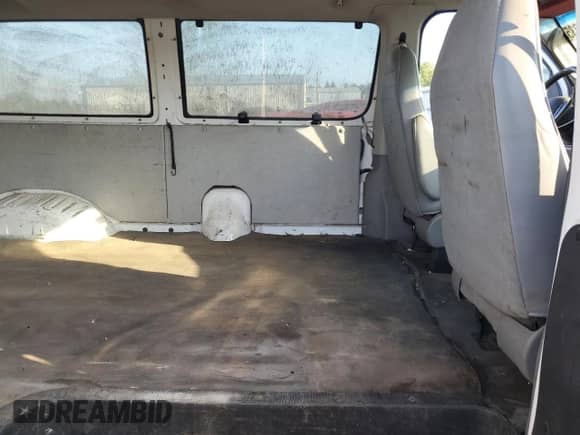 2003 Ford Econoline Cargo с VIN 1FTNE24L03HB26193, выставлен на аукционе Copart как лот 70434935 с пробегом 145 404 миль миль и Списание • Salvage title. История ставок и продаж доступна на DreamBid. Изображение 11.